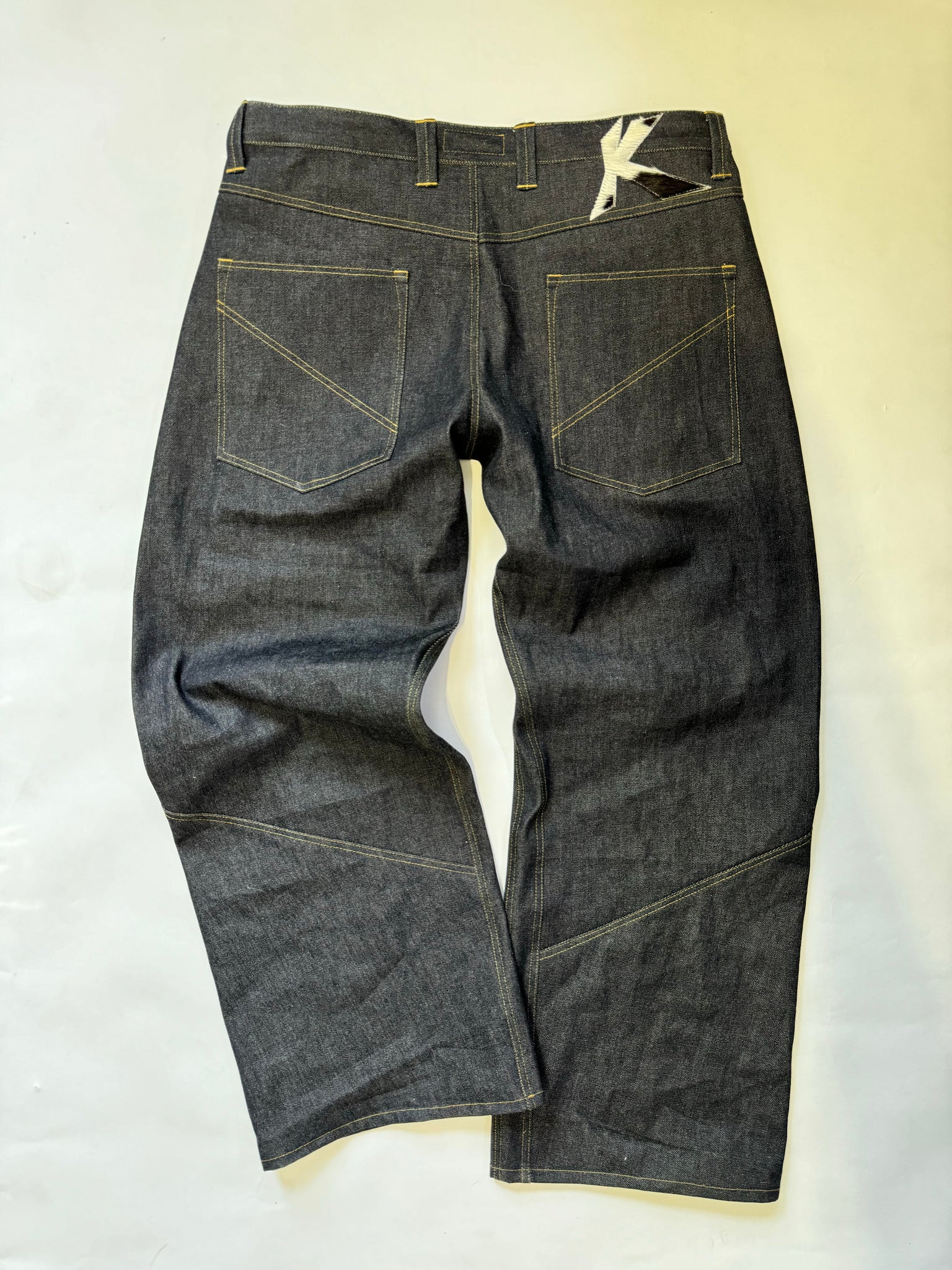 Intertwined Raw Denim Jeans