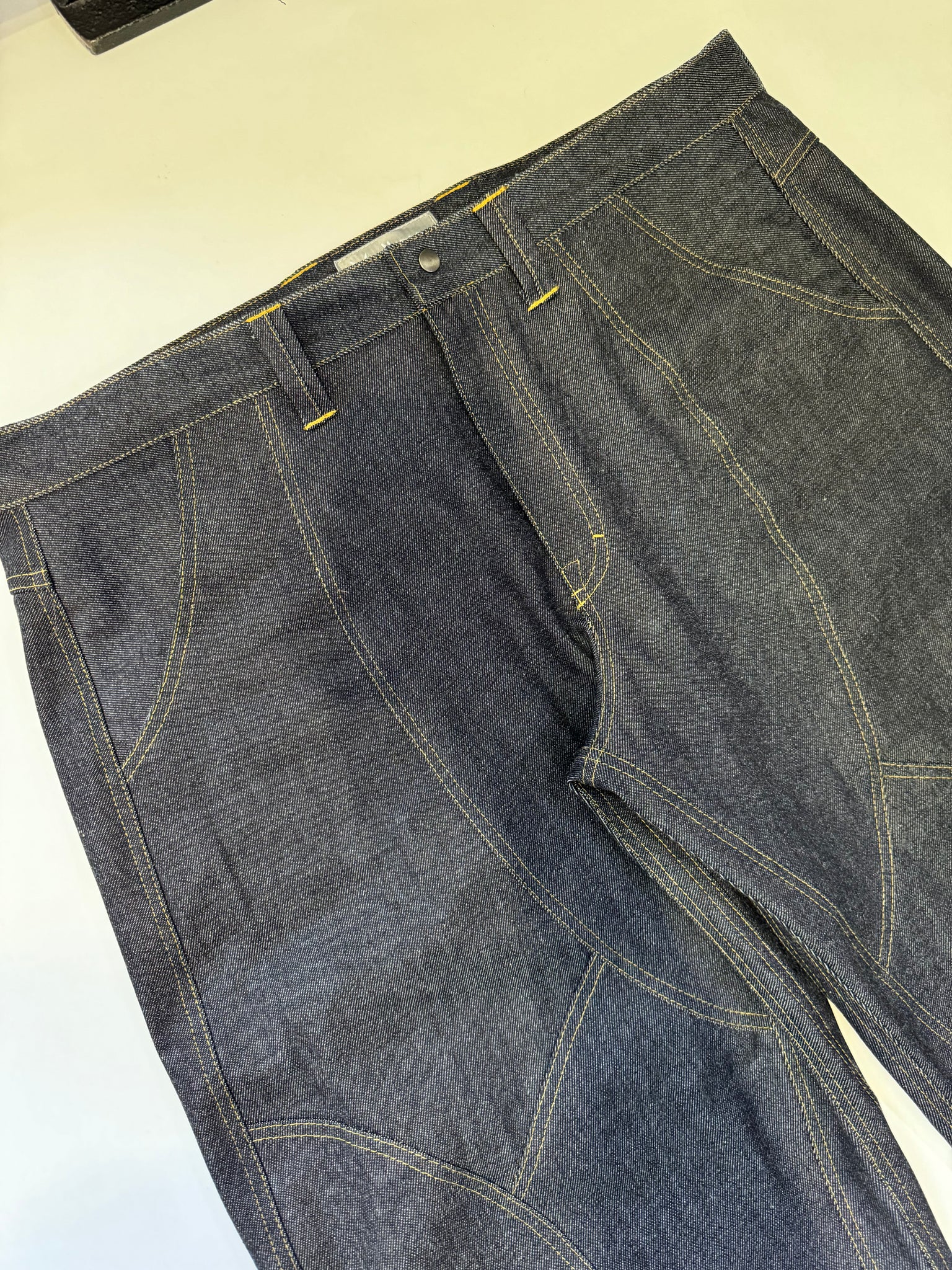 Intertwined Raw Denim Jeans