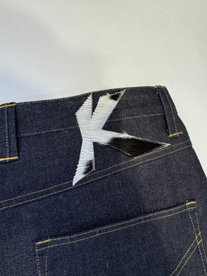 Intertwined Raw Denim Jeans